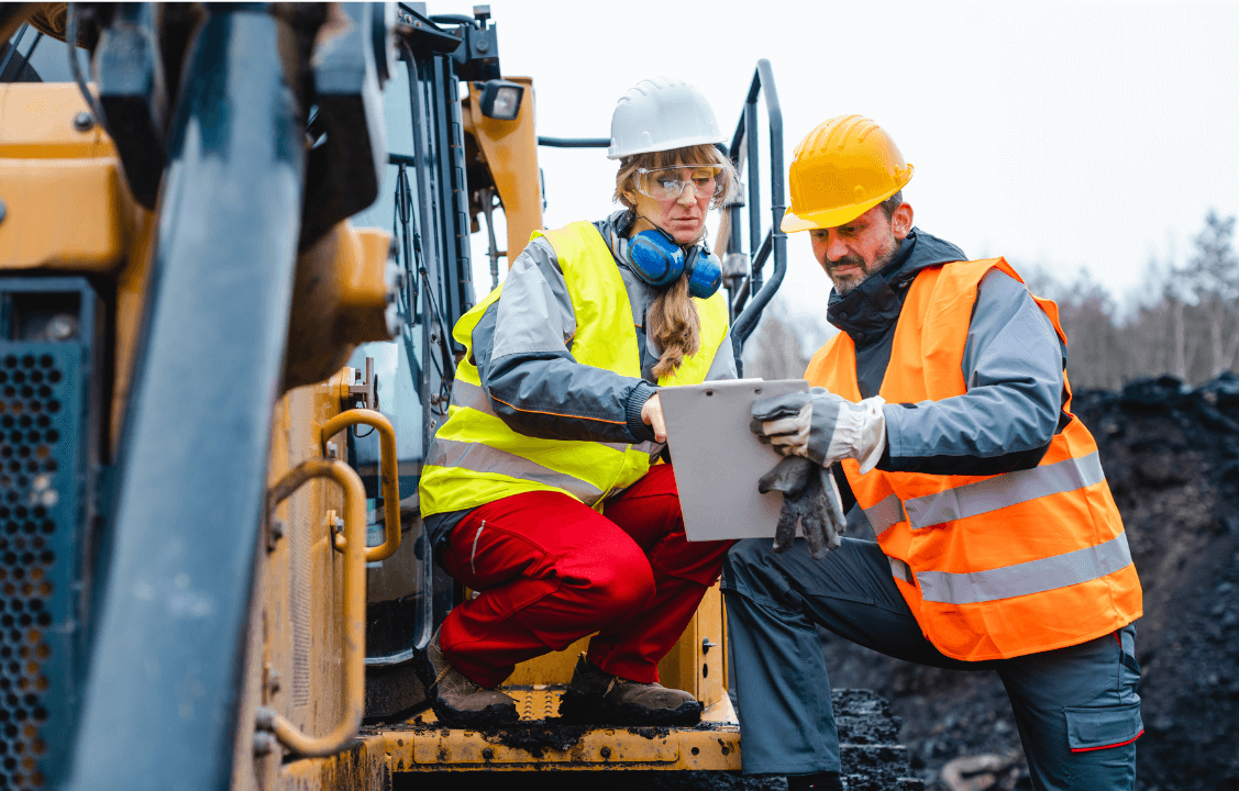 Site workers wearing protective gear.